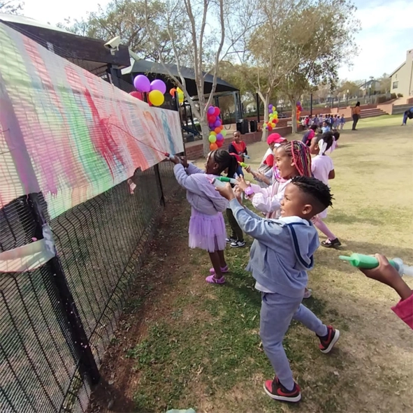 Kids painting outside